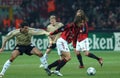 Andrea Pirlo and Roy Makaay in action during the match